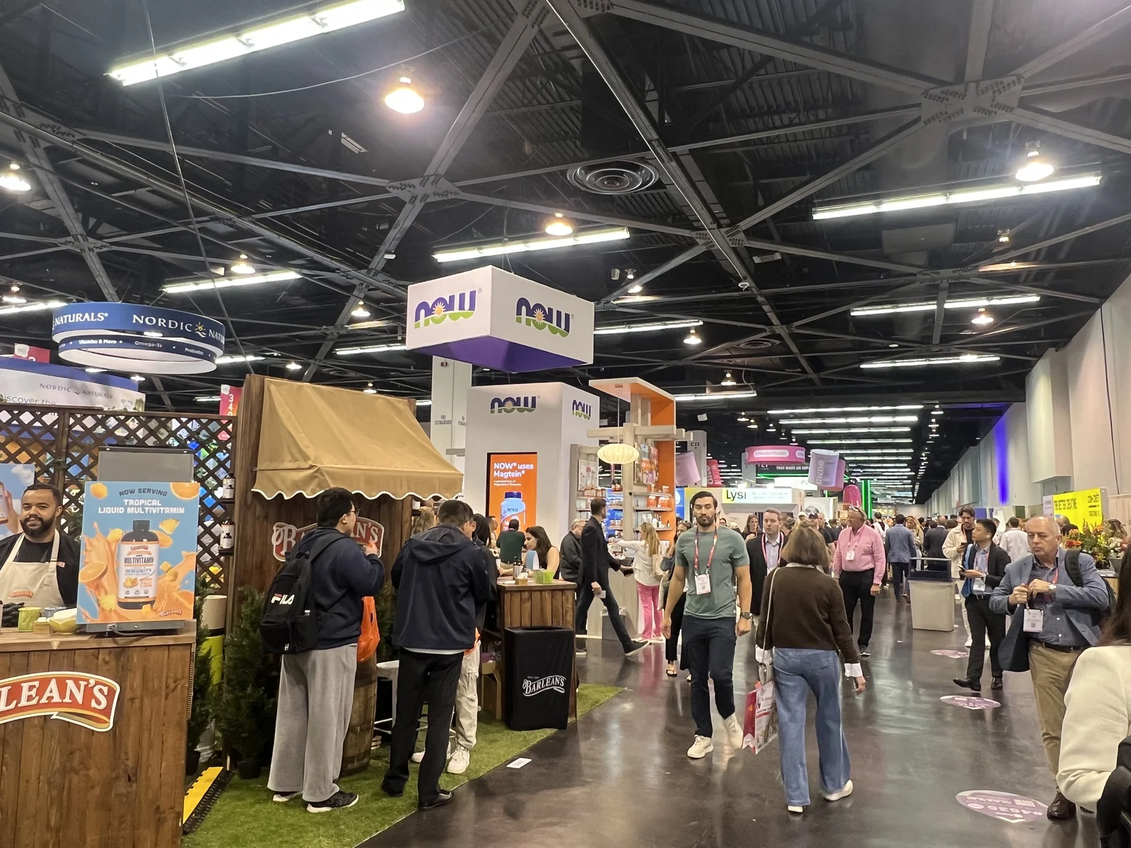 Visitors walk through the exhibition hall at Natural Products Expo West