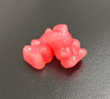 Red bear-shaped gummy samples for apple cider vinegar gummies with B12 and folate