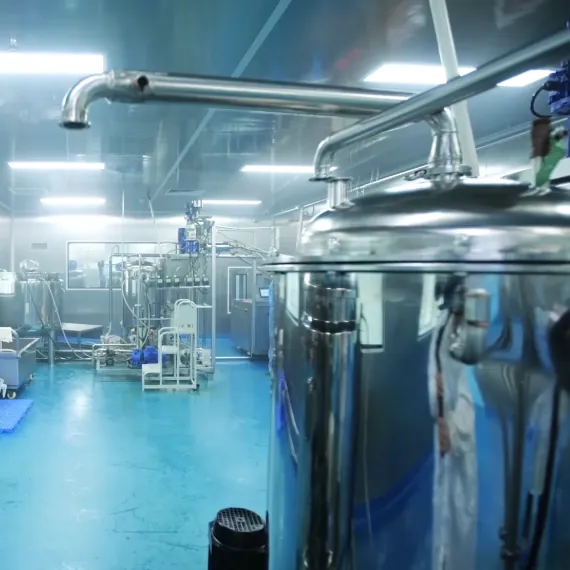 Stainless steel cooking and mixing tanks used for ashwagandha gummy production under controlled temperature, low-oxygen and pH conditions to reduce total withanolides activity loss.