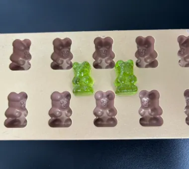 Green biotin B12 gummy samples for a water-soluble B-vitamin combination formula, supporting vegan B12 supplementation and relaxation-focused product positioning for brands.