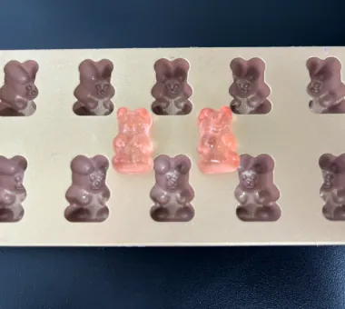 Pink sugar-free biotin gummy samples made with maltitol or erythritol and no free sugars, supporting calorie-conscious and zero-sugar certification planning.