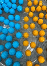 Blue and orange gummies for a women’s pre-workout D3 K2 creatine project, with an optional CoQ10 gummy formula for exercise and cellular-respiration support positioning.