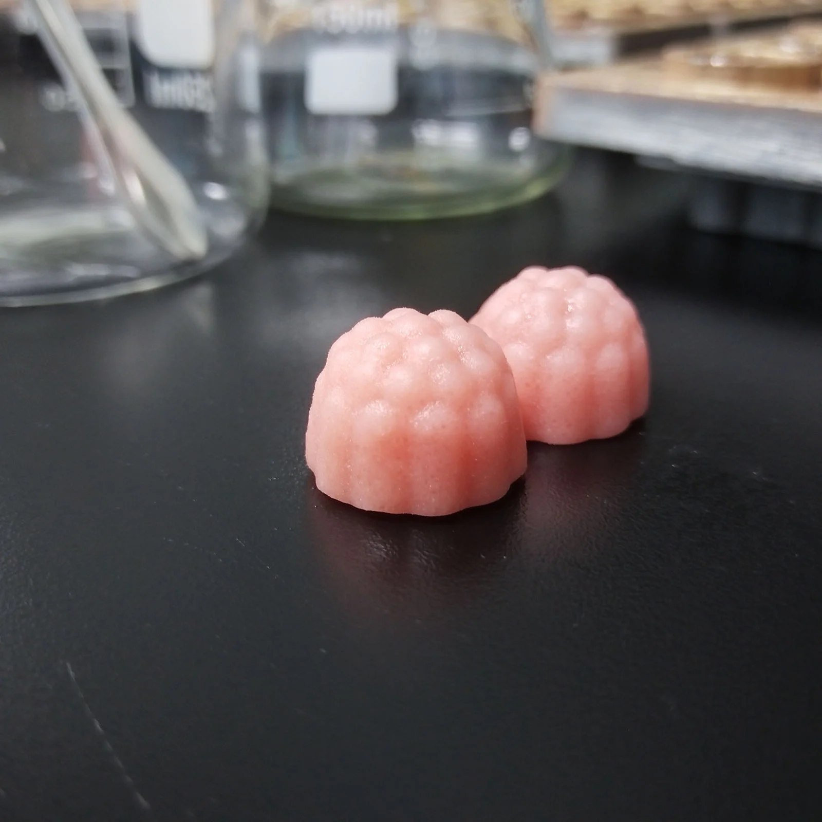 Light pink peach-flavored creatine gummy samples developed for private label supplement projects