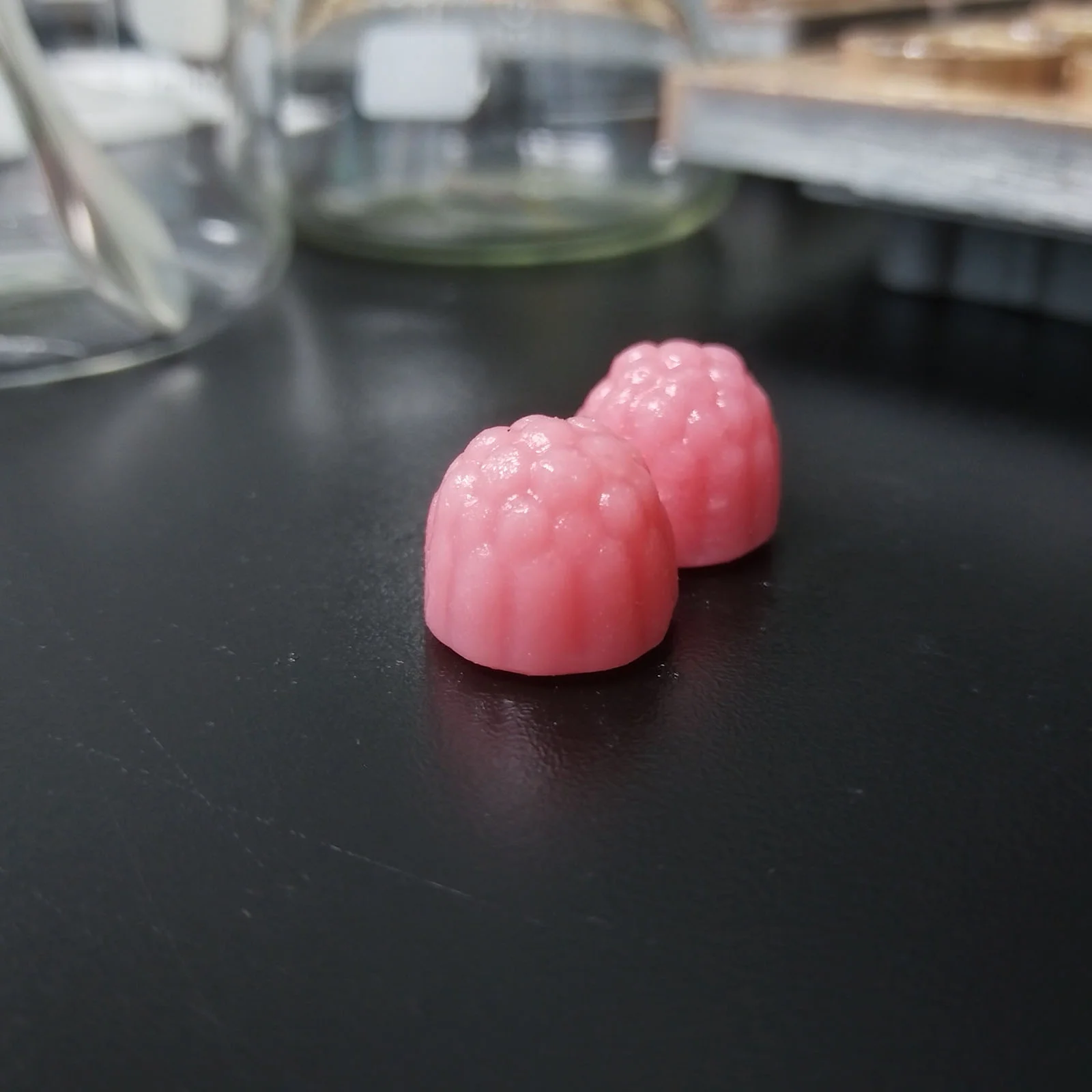 Pink watermelon-flavored creatine gummy samples developed for private label supplement projects