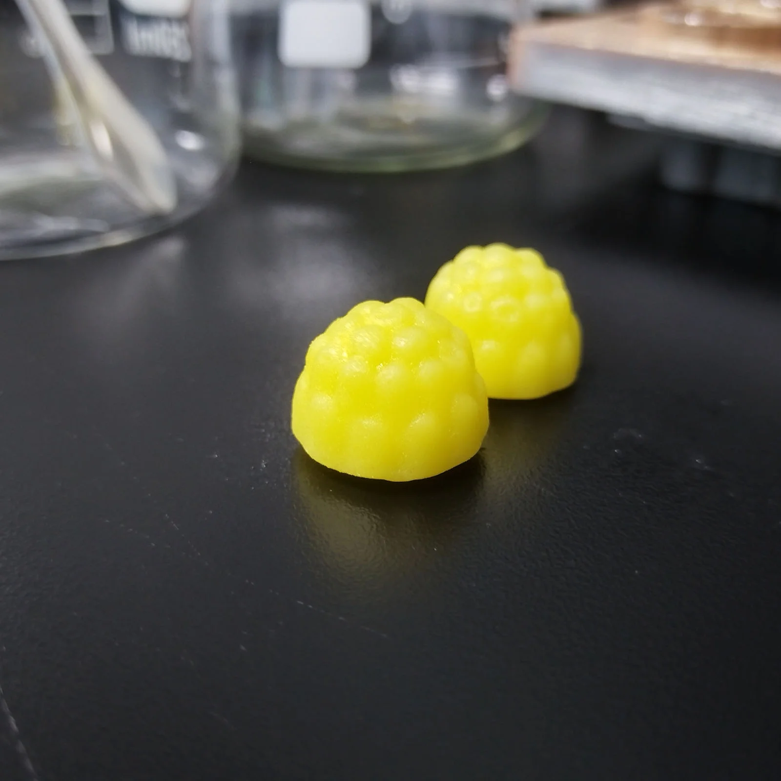Yellow pineapple-flavored creatine gummy samples developed for private label supplement projects