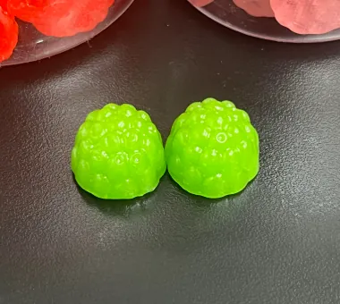 Two bright green Sour Apple Creatine Gummies developed to mask multi-ingredient flavors and create a refreshing, differentiated Daily Creatine Gummies option.