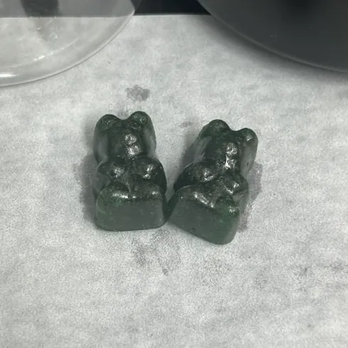 Dark bear-shaped gummy samples for custom elderberry gummy product development