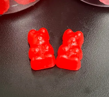 Red bear-shaped elderberry gummy samples for children's supplement product development