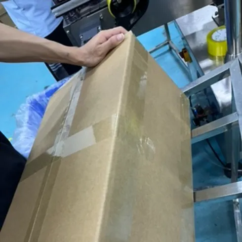Production staff handle a raw material batch during controlled glutathione gummy manufacturing