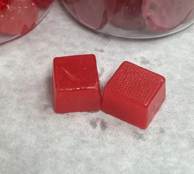 Red square high-dose iron gummies designed for customized elemental iron formulations