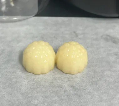 Pale yellow Chaga mushroom gummy samples for an antioxidant-focused product concept, supporting differentiated premium mushroom gummy development for private label brands.