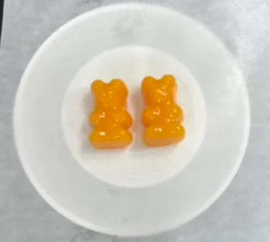 Orange high-dose collagen gummy bear samples developed to balance elevated collagen loading, chewable texture and taste for custom collagen protein gummy projects.