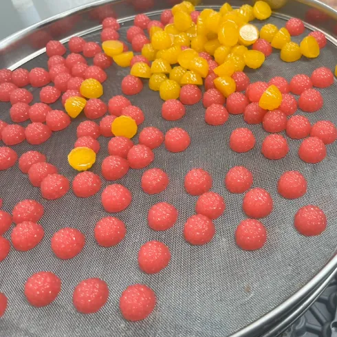 Gummy sample on a precision scale during sea moss gummy actual-input and serving-weight control