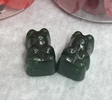Dark gummy samples for a sea moss and black seed oil gummy formula