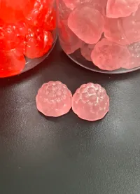 Pink gummy samples for a 500 mg sea moss dose-specification development case