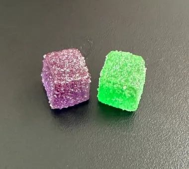Purple and green gummy samples for a custom vitamin C and zinc combination formula