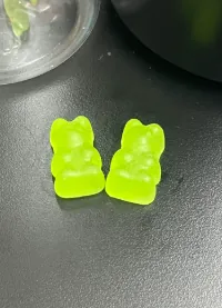Green bear-shaped vitamin C gummies for kids and family nutrition formulations