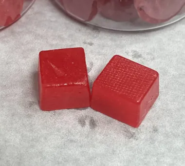 Red square gummy samples for 4 g women's creatine D3 K2 B12 gummy formulations